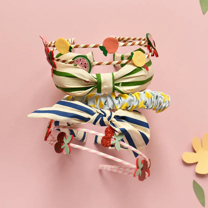 Cerchietto Rockahula Ciliegie a Righe Verdi con Nodo – Bambina
