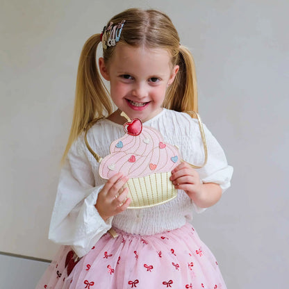 Bambina con borsetta a tracolla Mimi & Lula Cutey Cupcake