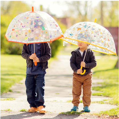 Bambini che giocano sotto la pioggia con gli ombrelli Djeco cambia colore – collezione Facce