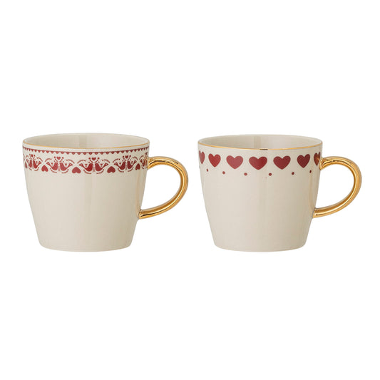 Tazza natalizia Bloomingville Jolly in ceramica rossa con cuori