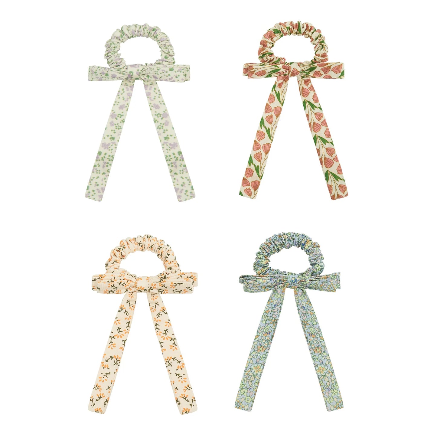 Elastici capelli bambina con fiocco floreale Mimi & Lula indossati su coda bassa