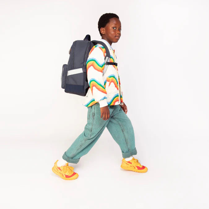 Bambino con zaino Jeune Premier New Bobbie Skate sulle spalle, ideale per scuola primaria