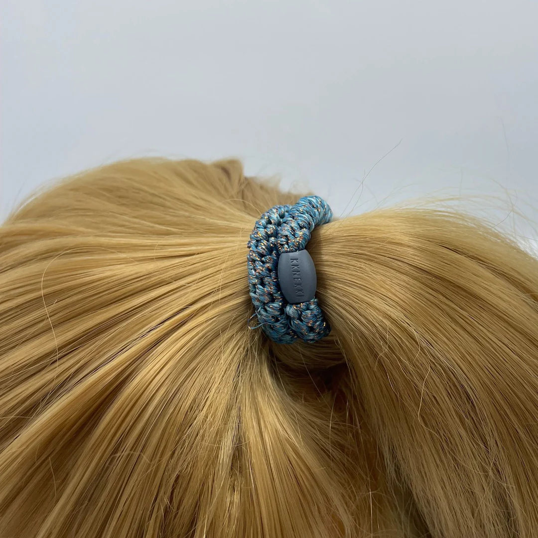 Braccialetto elastico Kknekki con dettagli blu e bronzo