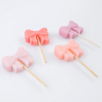 Meri Meri – Candele Fiocco Rosa per Torta (x4)