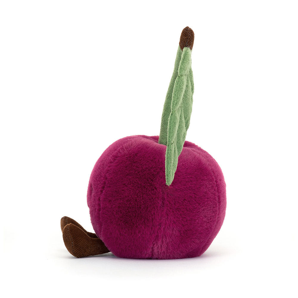 Peluche Amuseables Cherry Jellycat visto di lato, morbido con dettagli colorati e occhi scintillanti