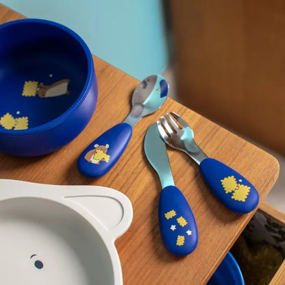 Posatine Moulin Roty Puce & Pilou sulla tavola